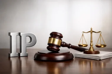 IP letters with gavel and scales of justice