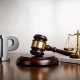 IP letters with gavel and scales of justice