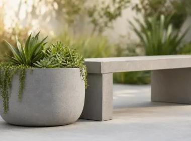 Concrete planter with succulents by bench